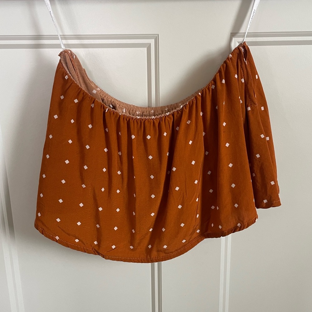 Faithful the Brand burnt orange strapless top.